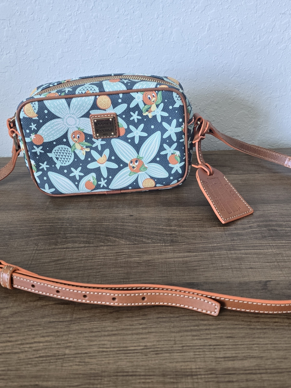 Dooney and Bourke Disney Parks Epcot Flower & Garden Orange Bird Croaabody